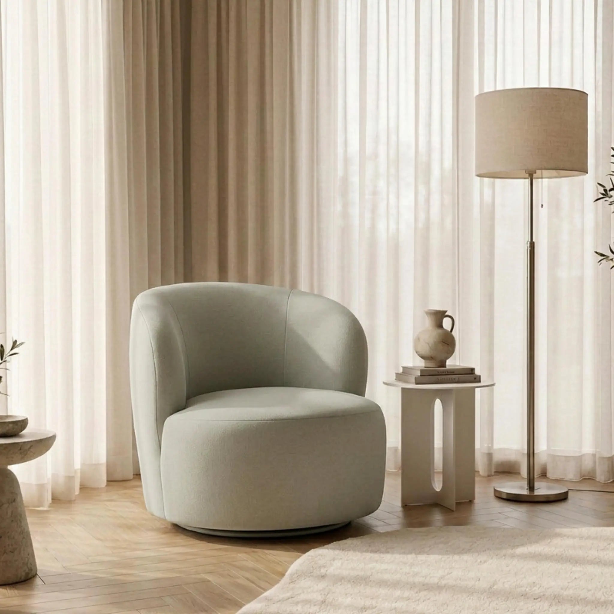 Sillón giratorio Wilson tapizado en tejido Aqua | Kubu #