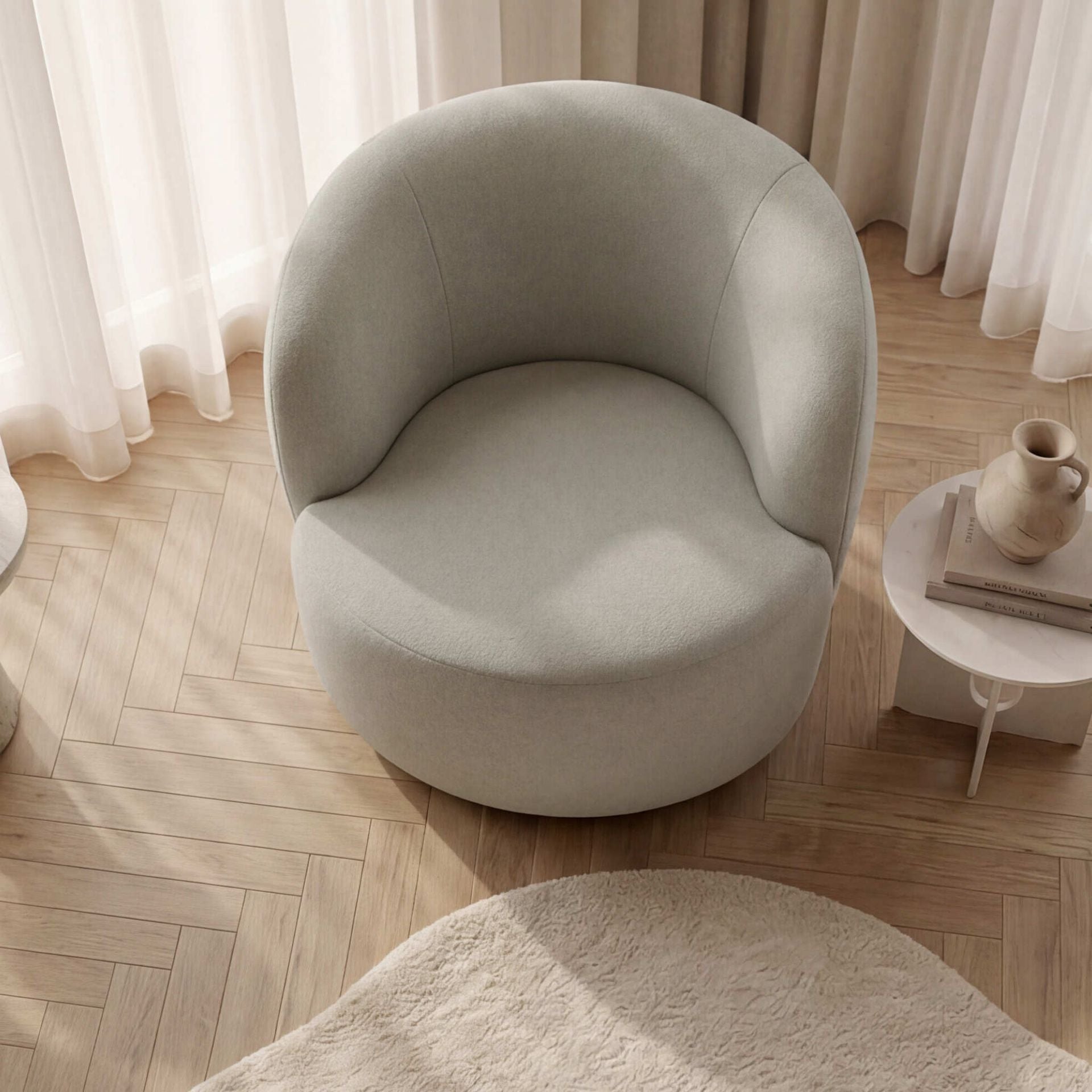 Sillón giratorio Wilson tapizado en tejido Aqua | Kubu #
