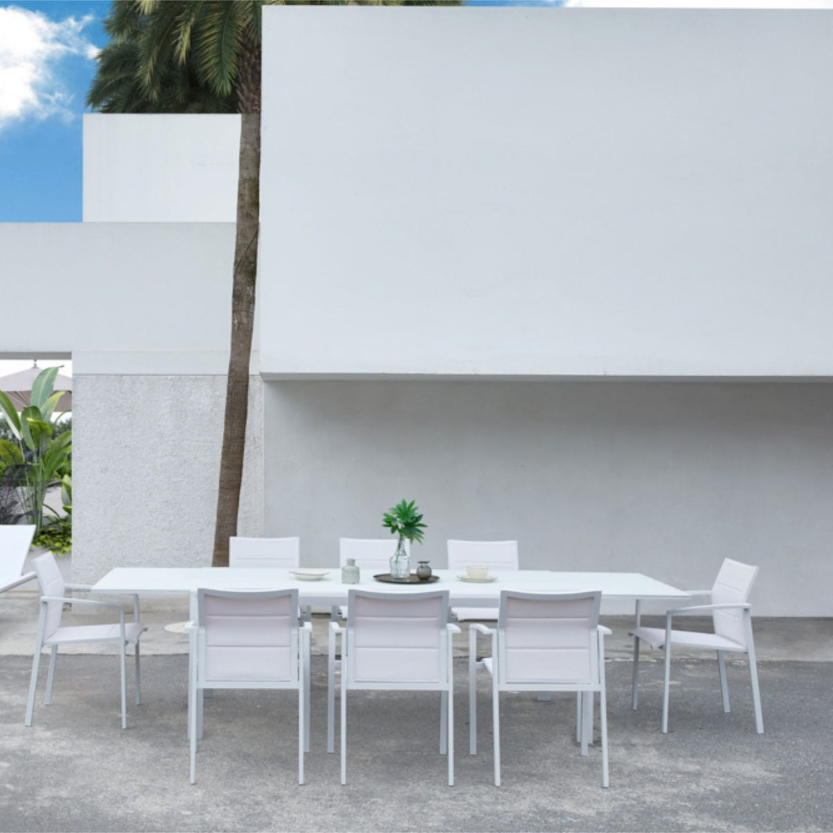 Mesa extensible ORICK 100 x 150/225 cm aluminio y cristal blanco | KUBU #